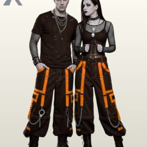 Wide leg black alt-fashion pants with bright orange strap accents and hanging metal hardware.