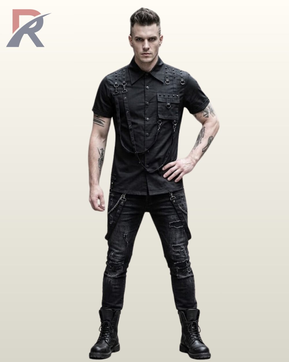 Full front model view of a men's black gothic industrial short-sleeve shirt featuring metal studs, shoulder D-rings, chest pocket, and hanging harness straps.