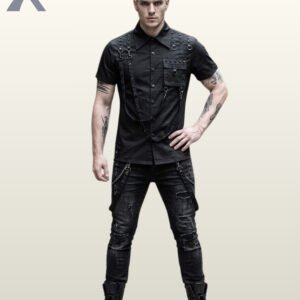 Full front model view of a men's black gothic industrial short-sleeve shirt featuring metal studs, shoulder D-rings, chest pocket, and hanging harness straps.