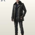 A model wearing a premium vintage black leather car coat featuring a plush dark fur collar and button closures.