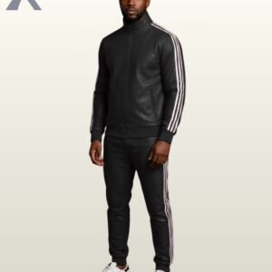 A man standing in a full-body view wearing a premium black leather tracksuit featuring white side stripes.