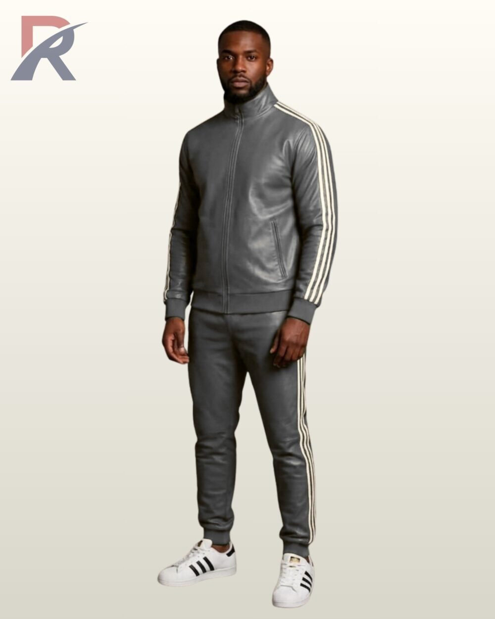 A man wearing a charcoal gray leather tracksuit with white sporty side stripes.