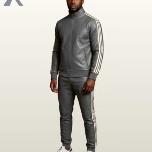 A man wearing a charcoal gray leather tracksuit with white sporty side stripes.