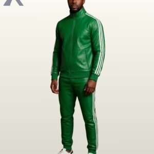 A man standing full-length in a rich emerald green leather tracksuit with crisp white stripes.