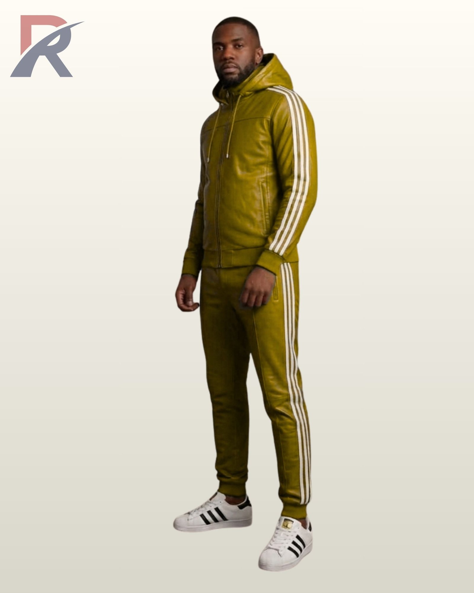 A profile shot of a mustard green leather hoodie and matching fitted joggers.