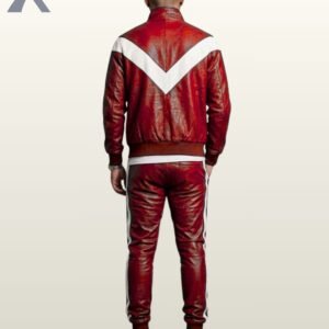 Streetwear styled red leather two-piece athletic suit paired with crisp white sneakers.