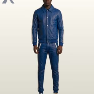 A man wearing a royal blue leather tracksuit with white side stripes.
