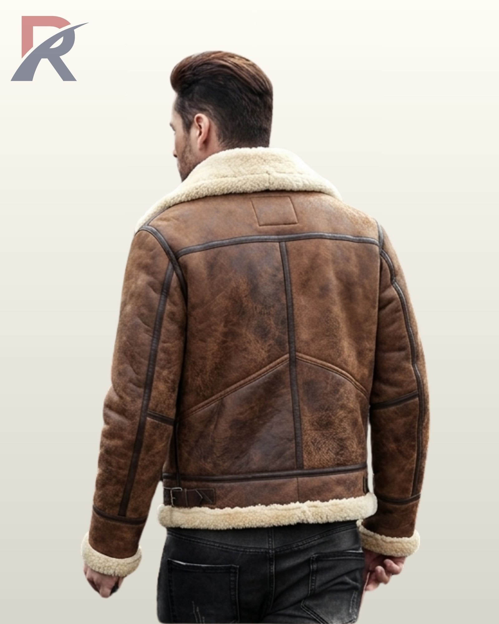 A model wearing a premium distressed brown leather winter bomber jacket with soft cream fleece lining.