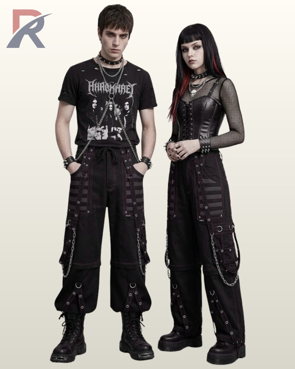 Man and woman modeling dark monochrome techwear pants featuring grey mesh trim, metal D-rings, and eyelet straps.