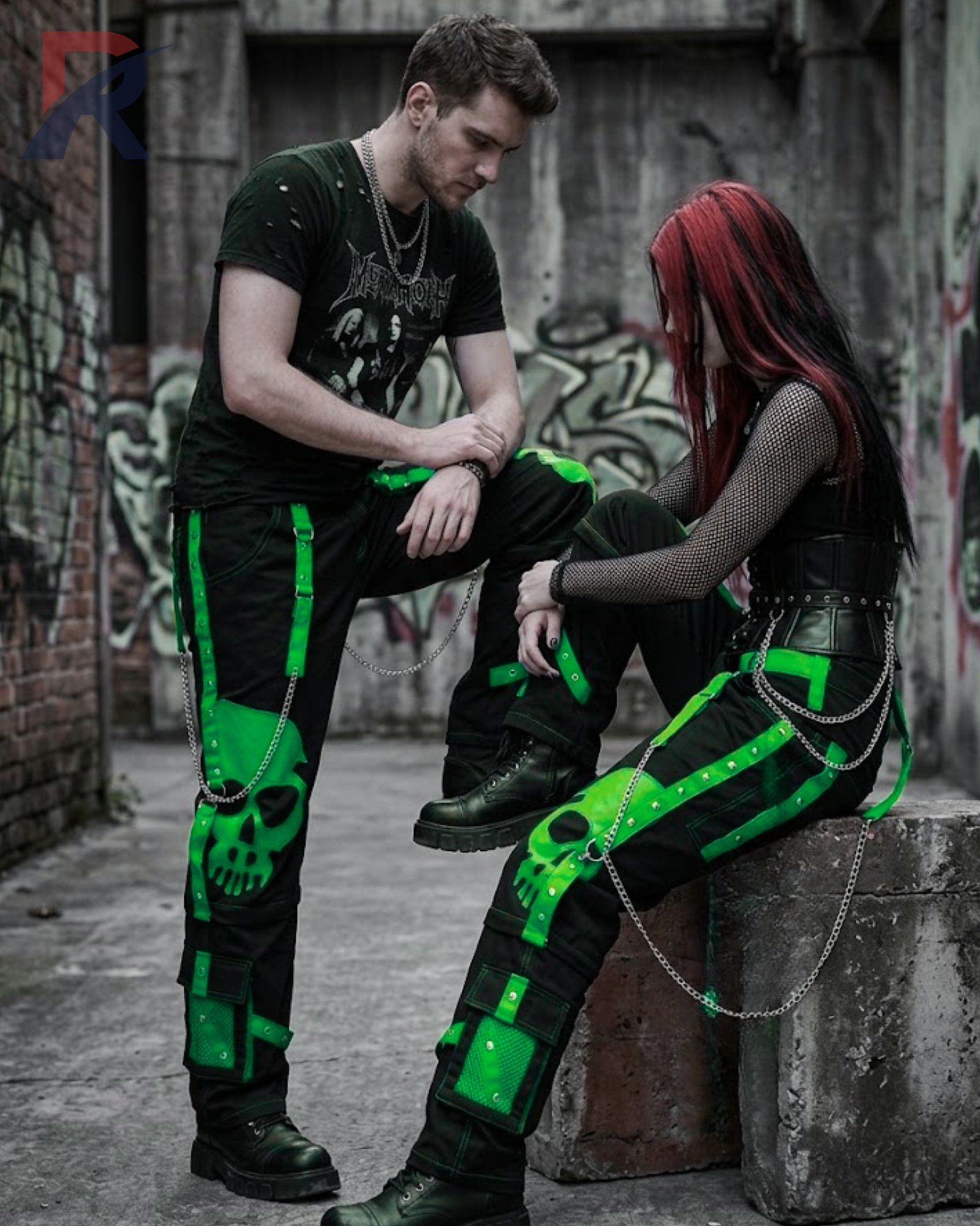 Wide-leg alternative black trousers with vibrant lime green skull prints and metal D-rings.