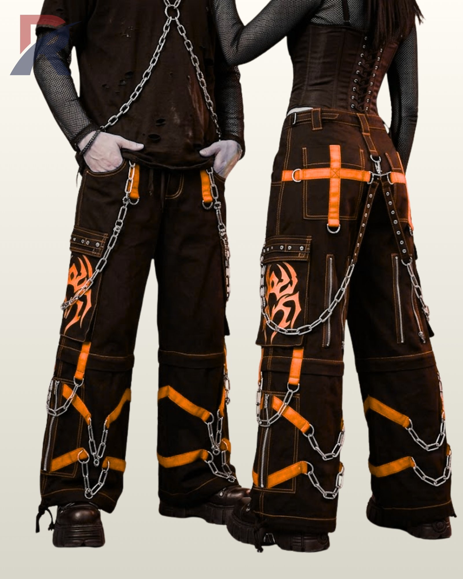 Gothic couple wearing wide-leg black pants detailed with neon orange tribal pocket artwork.