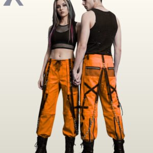 Man and woman modeling orange cyber goth trousers accented with black bondage straps, eyelets, and silver metal chains.