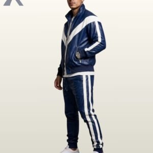 Man wearing a royal blue 2-piece leather tracksuit set featuring a zip-up jacket and matching trousers with white side stripes.