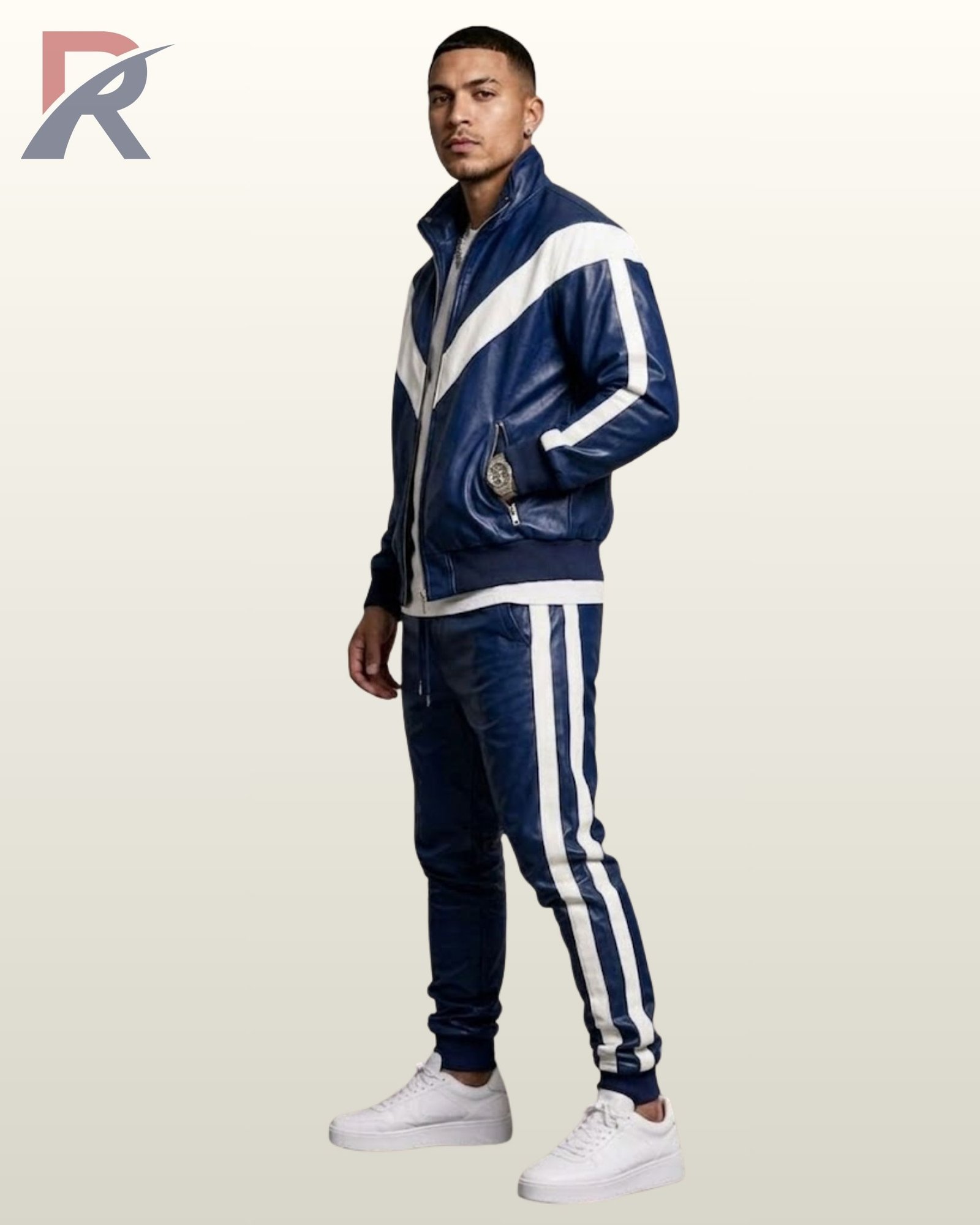 Man wearing a royal blue 2-piece leather tracksuit set featuring a zip-up jacket and matching trousers with white side stripes.