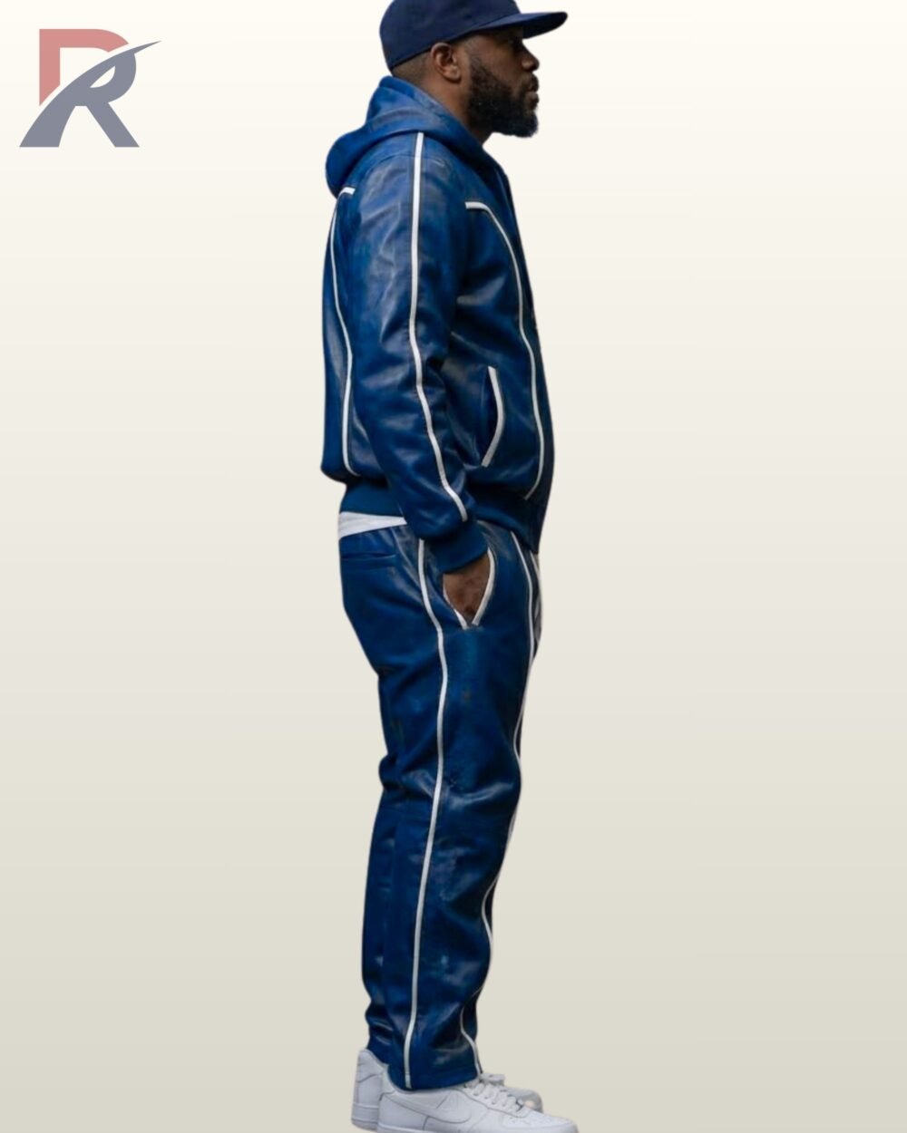 Royal blue leather track jacket with hood and matching drawstring pants featuring white piping details.