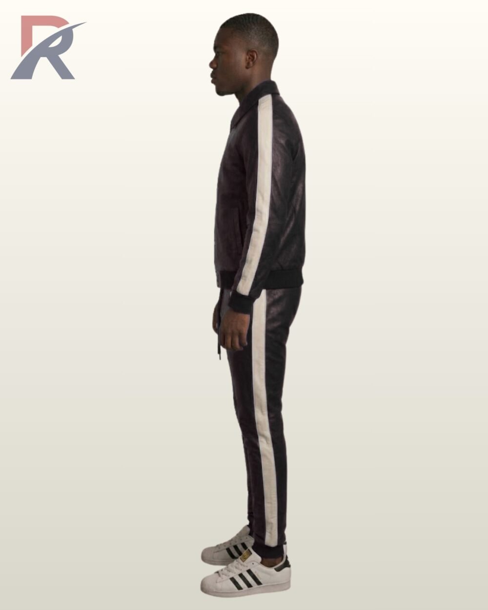 A designer black leather athletic suit featuring minimal white pocket accents.