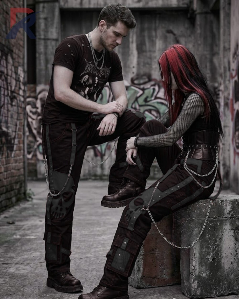 Baggy alternative all-black trousers styled with subtle grey skull overlays and chain links.