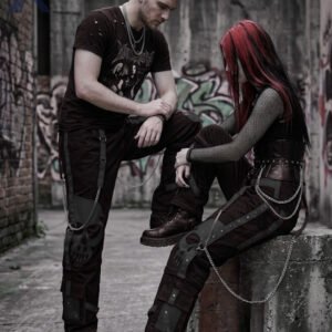 Baggy alternative all-black trousers styled with subtle grey skull overlays and chain links.