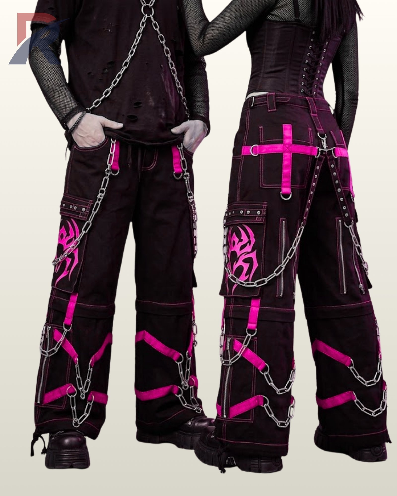 Baggy alternative black trousers styled with bright pink contrast webbing and metal D-rings.