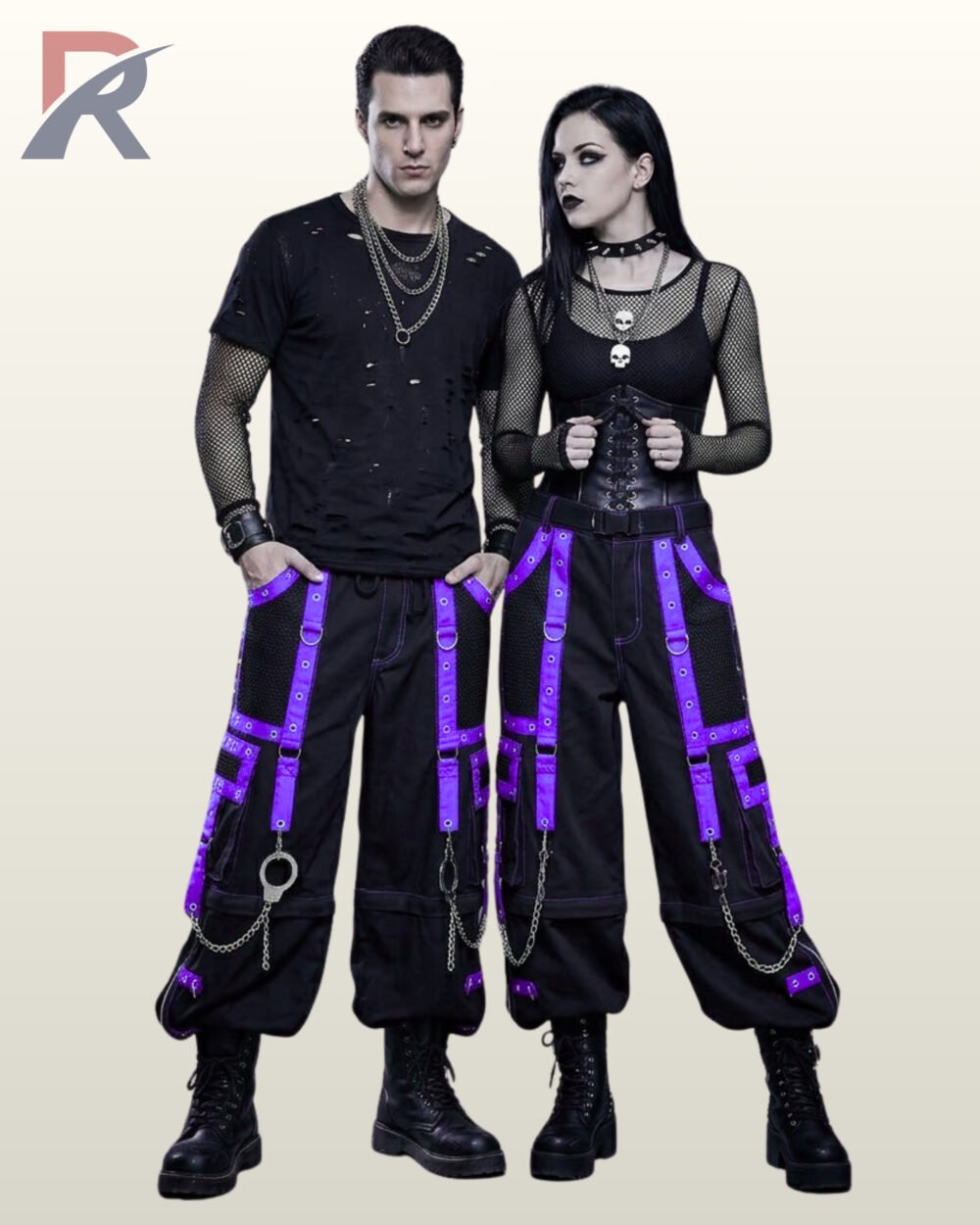 Full view of loose-fit punk style black cargo pants detailed with purple strap overlays.