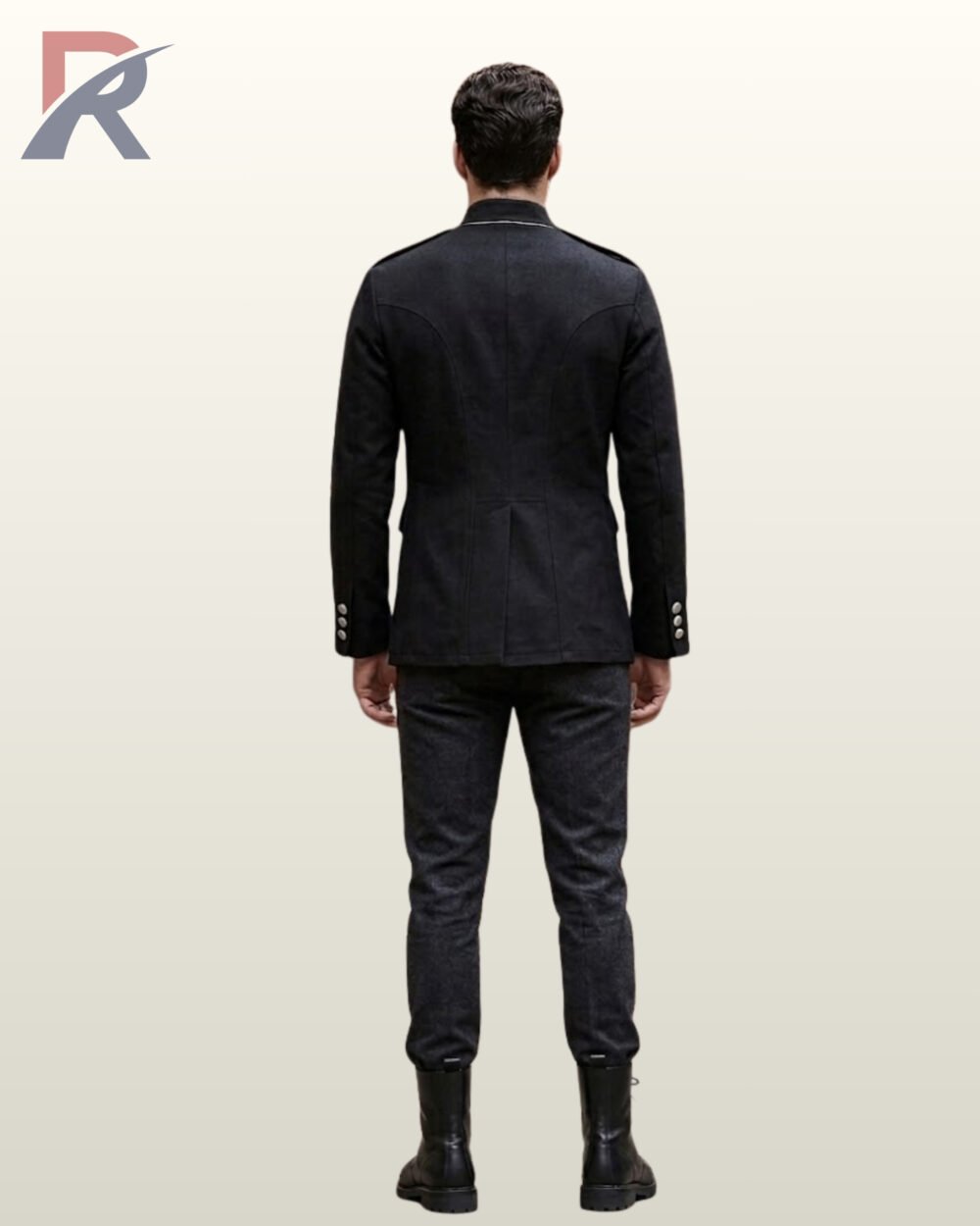 Back perspective of a men's black victorian field jacket with silver collar rim piping, slim dark trousers, and black combat boots.