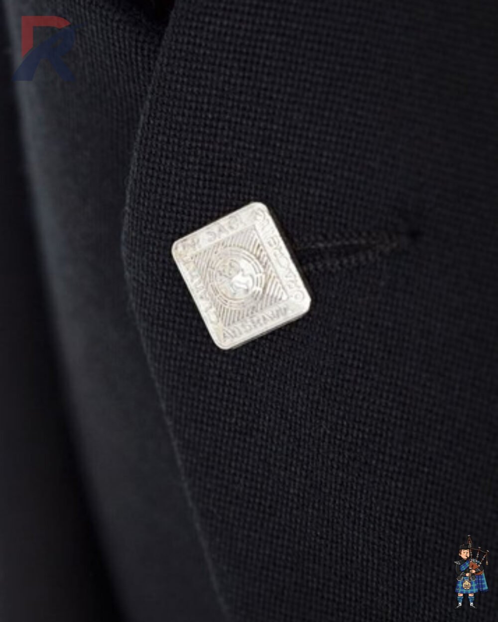 Detailed view of a traditional Scottish silver square button with ornate design on a black Argyle kilt jacket.