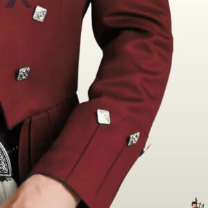 Close-up shot of a men's maroon burgundy Prince Charlie kilt jacket sleeve highlighting gauntlet cuffs and square silver buttons.