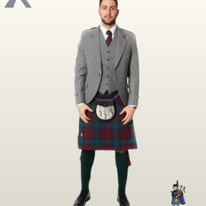 Traditional Scottish men's grey tweed kilt jacket set featuring gauntlet cuffs, bovine fur sporran, and dark green hose.
