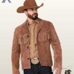Front view of a model wearing a men's cognac brown suede western fringe blazer featuring button front closure, notch lapels, and fringed pockets.