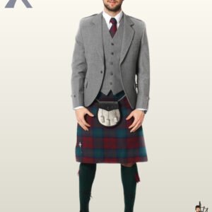 Full-length front view of a man wearing a complete light grey wool tweed Argyle kilt jacket and vest outfit set with a tartan kilt.
