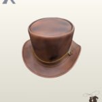 High-angle top perspective of a distressed brown leather steampunk top hat displaying its flat crown, curved brim, and side buckle detail.