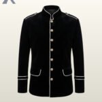 Direct front flat product view of a men's black velvet military officer jacket featuring white contrast piping, standing mandarin collar, and gold brass buttons.