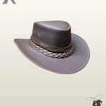 Handcrafted dark brown leather outback hat featuring a teardrop crease crown, curved side brims, and a braided leather band trim.