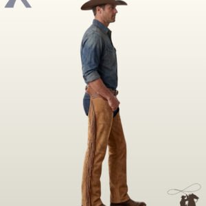 Men's handcrafted tan suede cowboy chaps showcasing side leg fringe detail, styled with denim jeans and cowboy boots.