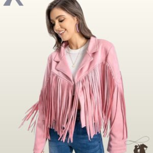 Front view of a model wearing a women's pink suede cropped western fringe jacket styled over a white t-shirt and blue jeans.