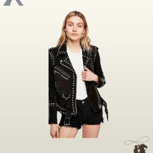 Women's heavy studded black suede biker jacket featuring silver metal rivets on lapels, shoulders, and pockets styled with a white tee and black shorts.