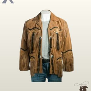 Men's tan suede cowboy coat with chest fringe, bone bead details, dark braided trim, and long leather tassels styled over a grey t-shirt and jeans.