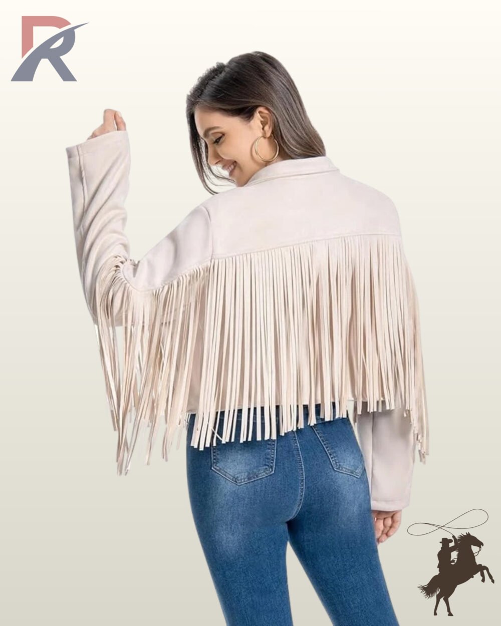 Rear view of a model wearing a women's beige suede cropped western jacket with long back yoke fringe trim and high-waisted blue jeans.