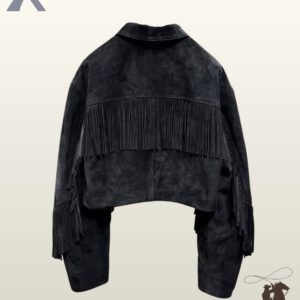 Rear view of a women's black suede cropped western jacket featuring a straight back yoke fringe trim and long arm tassels.