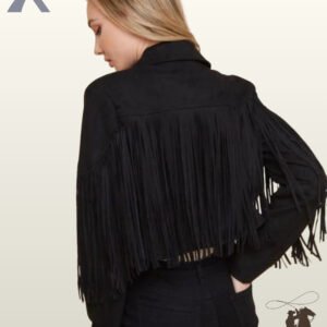 Back profile of a classic cropped black suede cowgirl jacket styled with black jeans and full-length arm fringe.