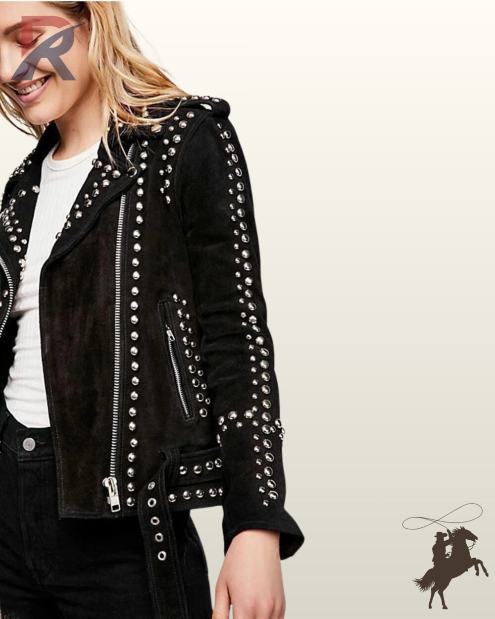 Side profile close-up of a model wearing an asymmetrical zip black suede moto jacket detailed with silver studs along the lapels, sleeves, and pockets.
