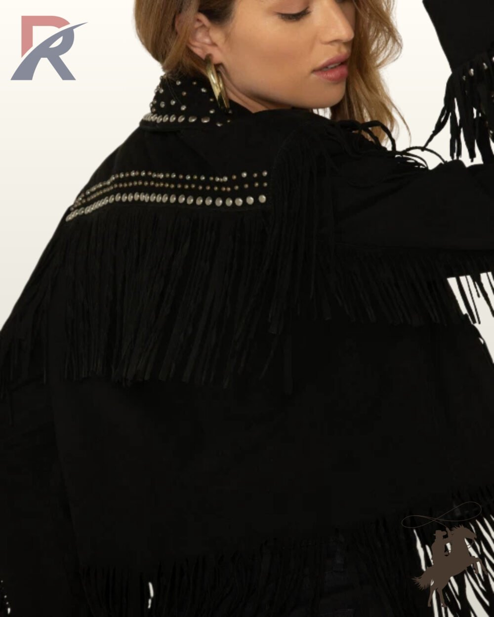 Close-up rear profile of a model showing the silver stud trim and layered back fringe on a women's black suede western jacket.