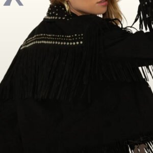 Close-up rear profile of a model showing the silver stud trim and layered back fringe on a women's black suede western jacket.