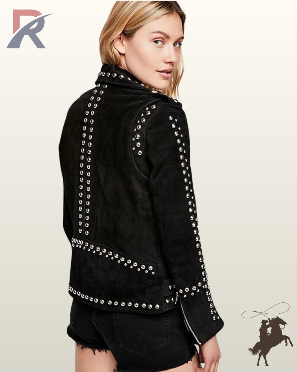 Back profile of a studded black suede biker jacket featuring silver rivet lines along the back panels and distressed black denim shorts.