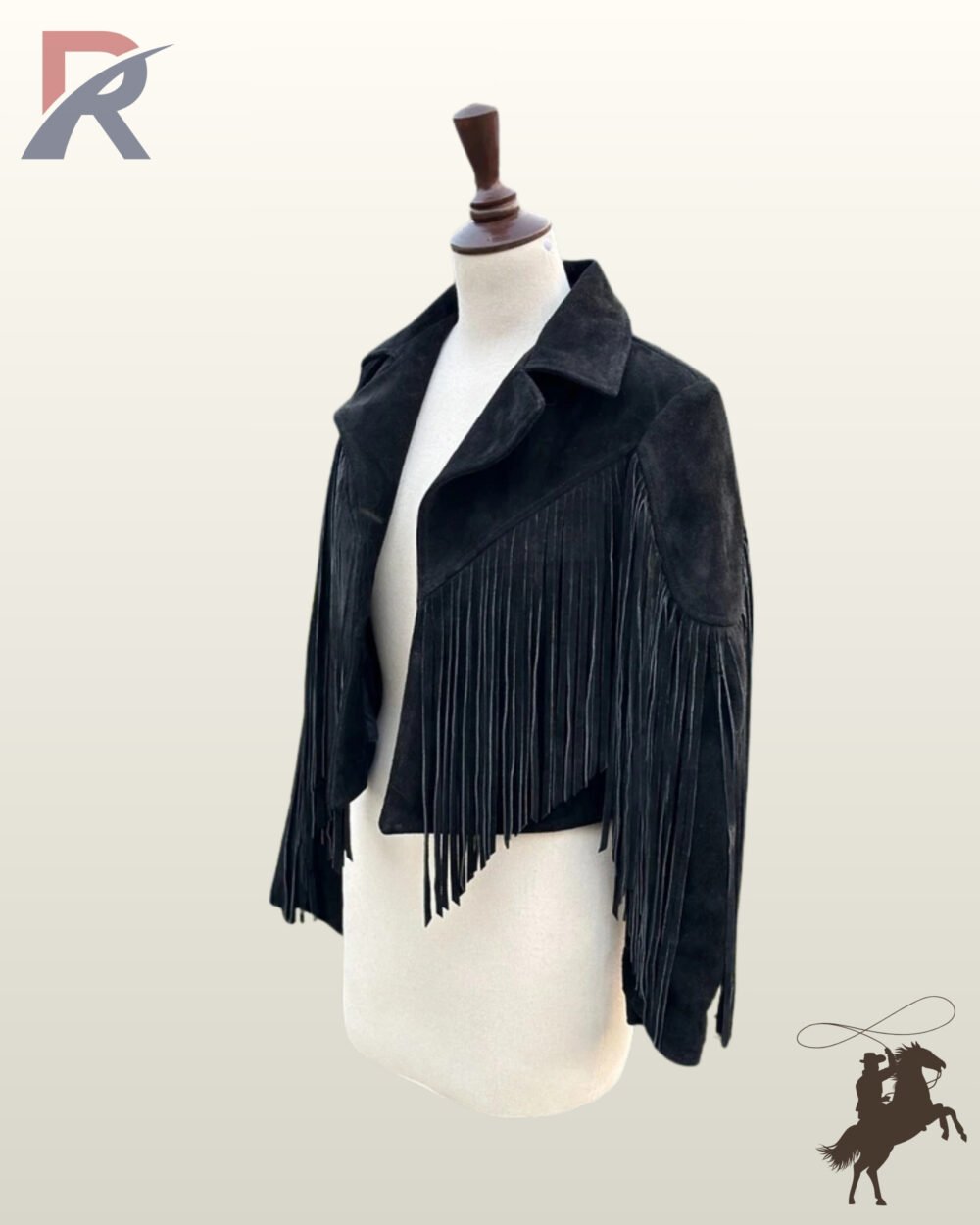 Three-quarter front view of a women's black suede cowgirl jacket featuring wide notch lapels and deep V-chest fringe.