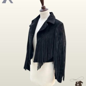 Three-quarter front view of a women's black suede cowgirl jacket featuring wide notch lapels and deep V-chest fringe.