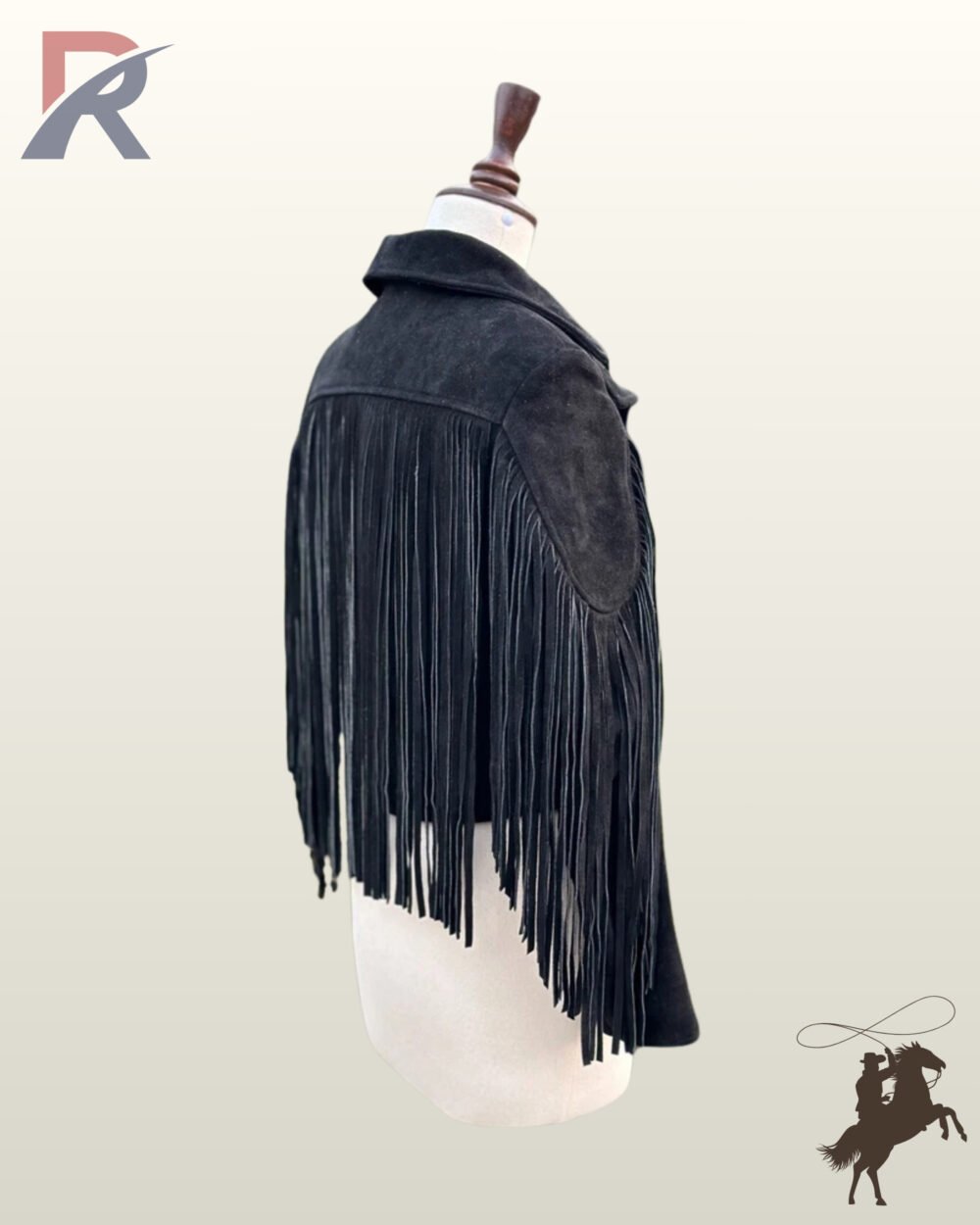 Rear three-quarter view of a black suede western fringe jacket on a mannequin showing full back yoke fringe.