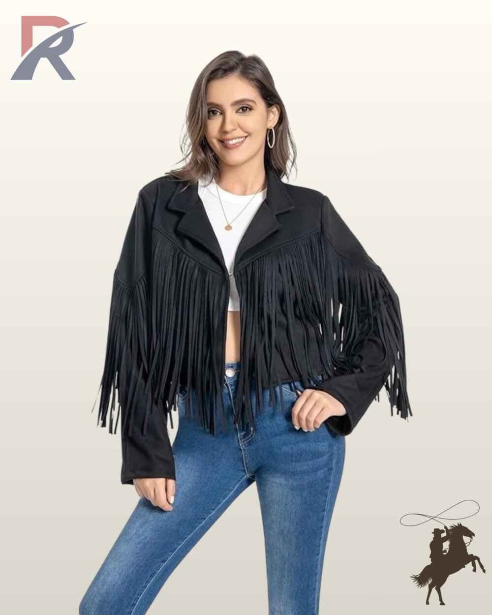 Front view of a smiling model wearing an open black suede western fringe jacket with a white top and blue jeans.