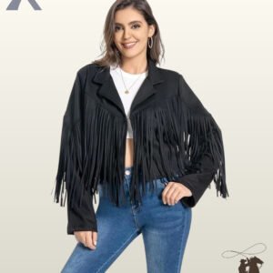 Front view of a smiling model wearing an open black suede western fringe jacket with a white top and blue jeans.