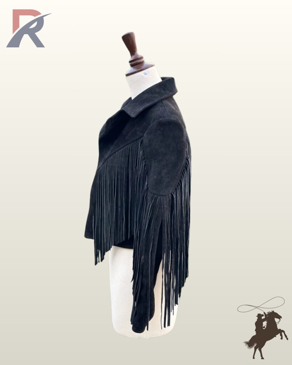 Side profile view of a women's black suede western jacket on a dress form showcasing flowing sleeve fringe.
